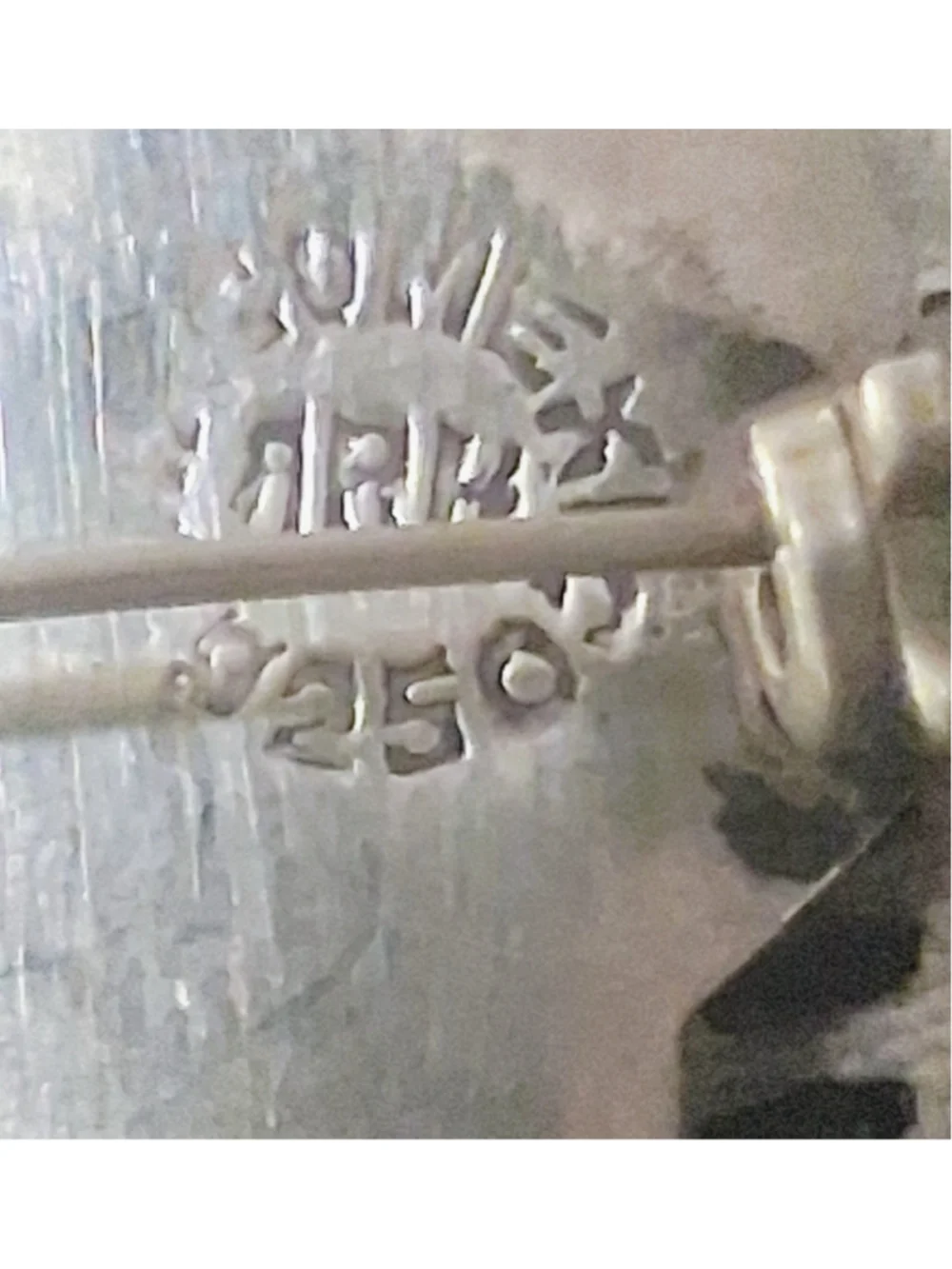 Unbranded sterling silver